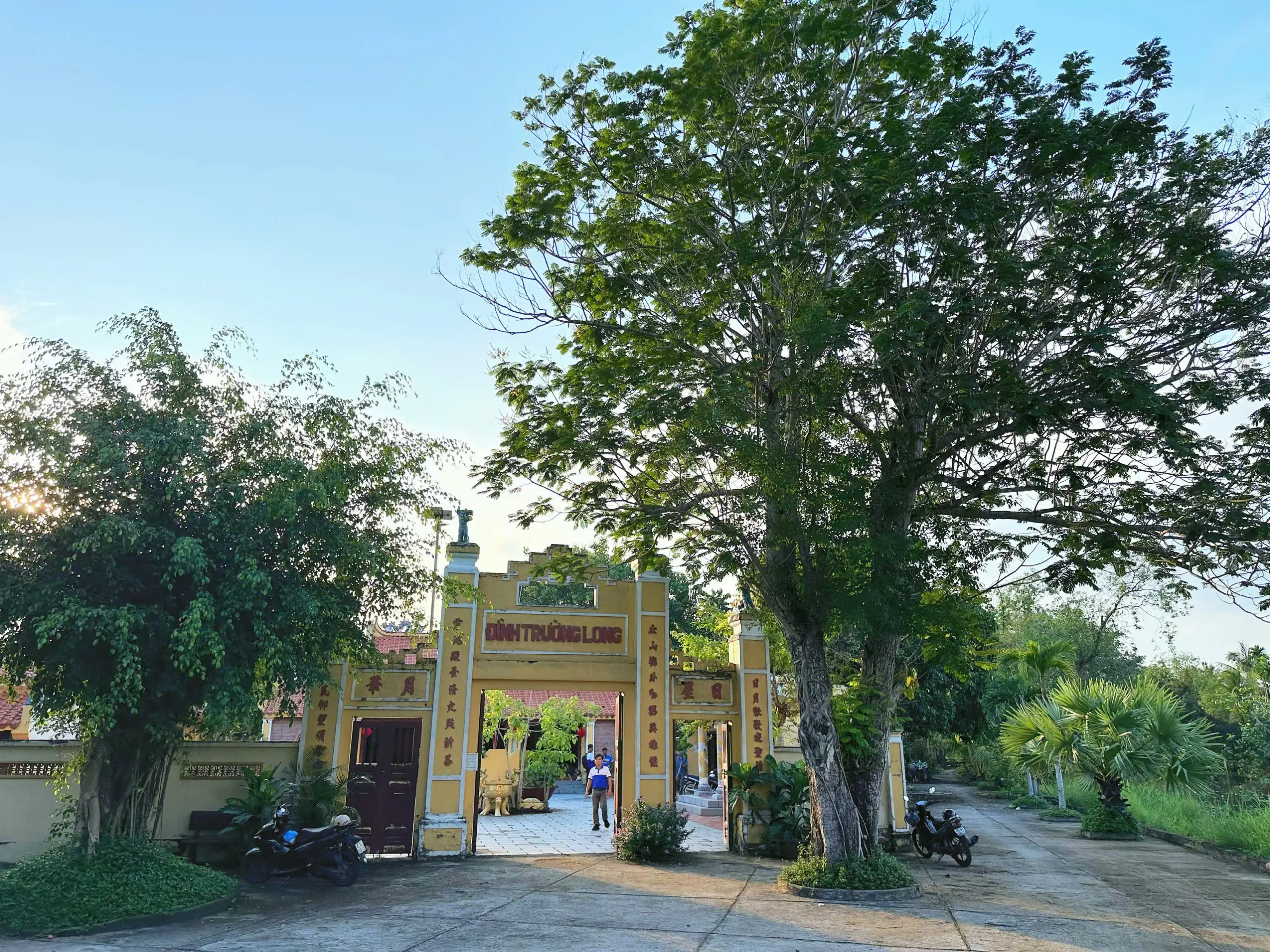 Discover the spiritual soul of the Mekong Delta at Truong Long Communal House in Phong Dien, Can Tho. This historical site stands as a testament to the region's rich cultural heritage and traditional architecture. Surrounded by ancient trees, the communal house (Đình) is a peaceful sanctuary where locals honor their ancestors and celebrate traditional festivals, making it a must-visit for those seeking authentic Vietnamese culture.