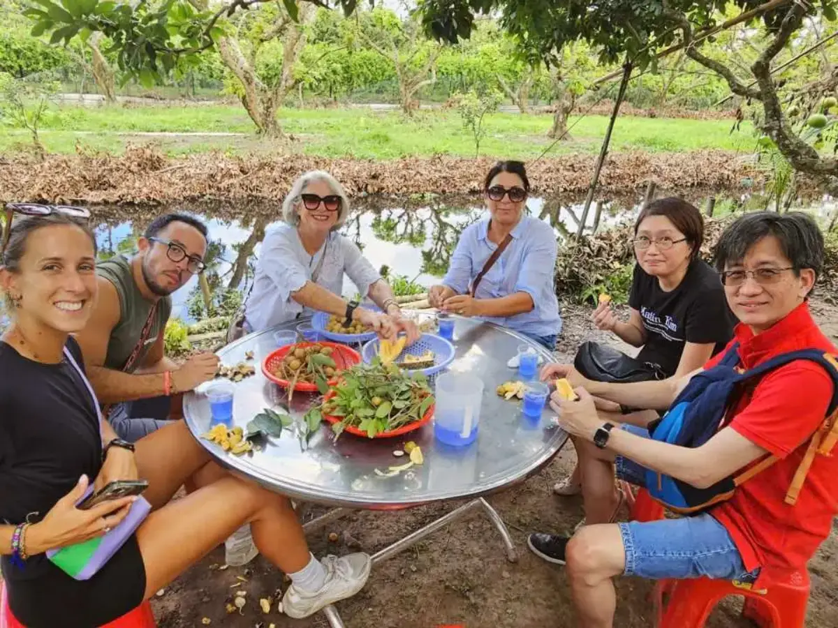 Enjoy fresh tropical fruits in a peaceful garden setting in Can Tho, part of the lush Mekong Delta. Taste seasonal specialties, relax by small canals, and experience authentic local hospitality in a traditional fruit orchard.