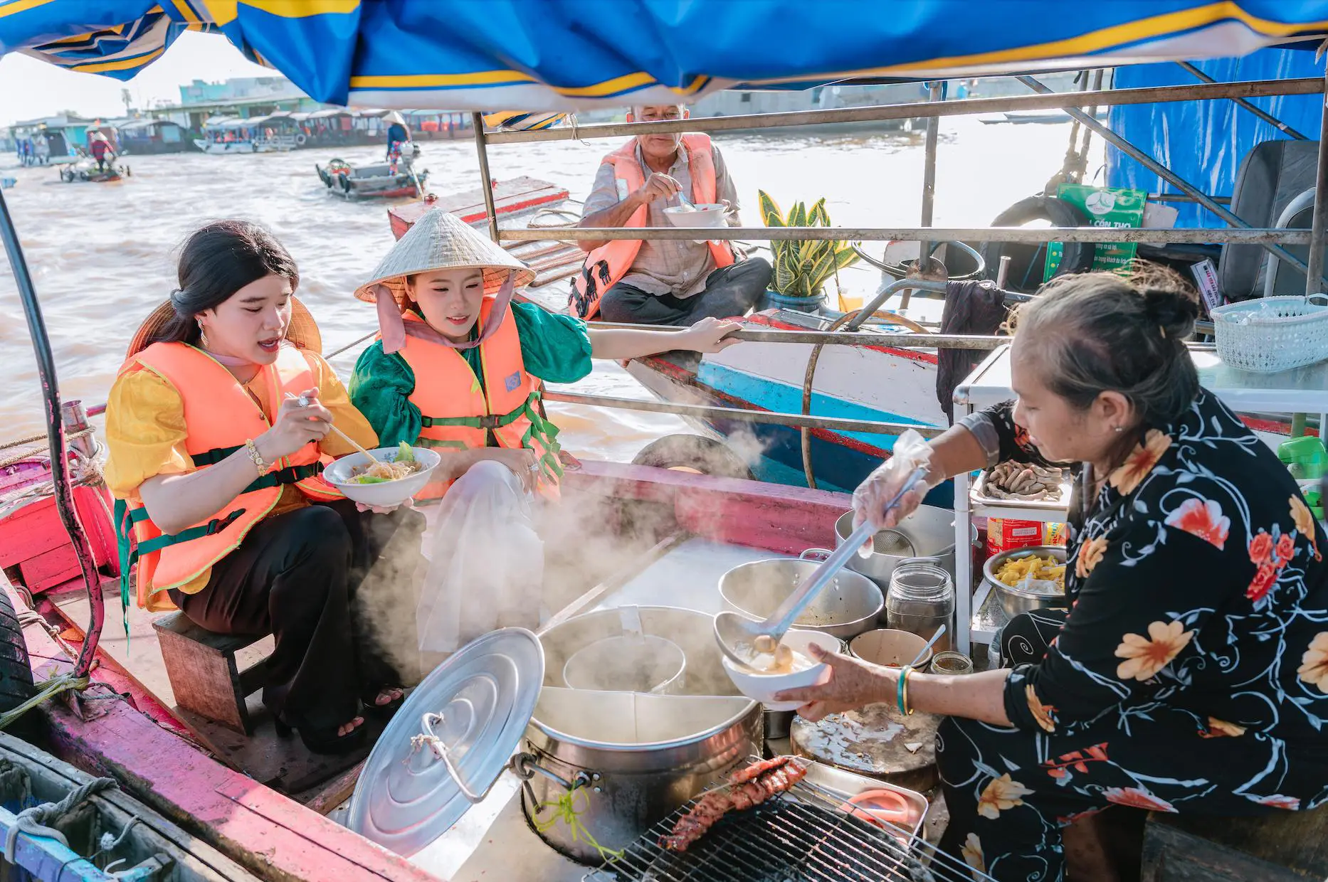 Hu tieu noodle boat at Cai Rang Floating Market